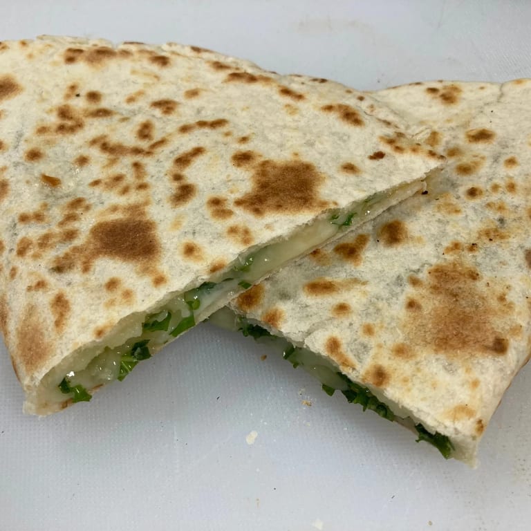 Indulge in Our Quesadilla