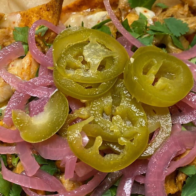 Side House Pickled Red Onions and Jalapeños.